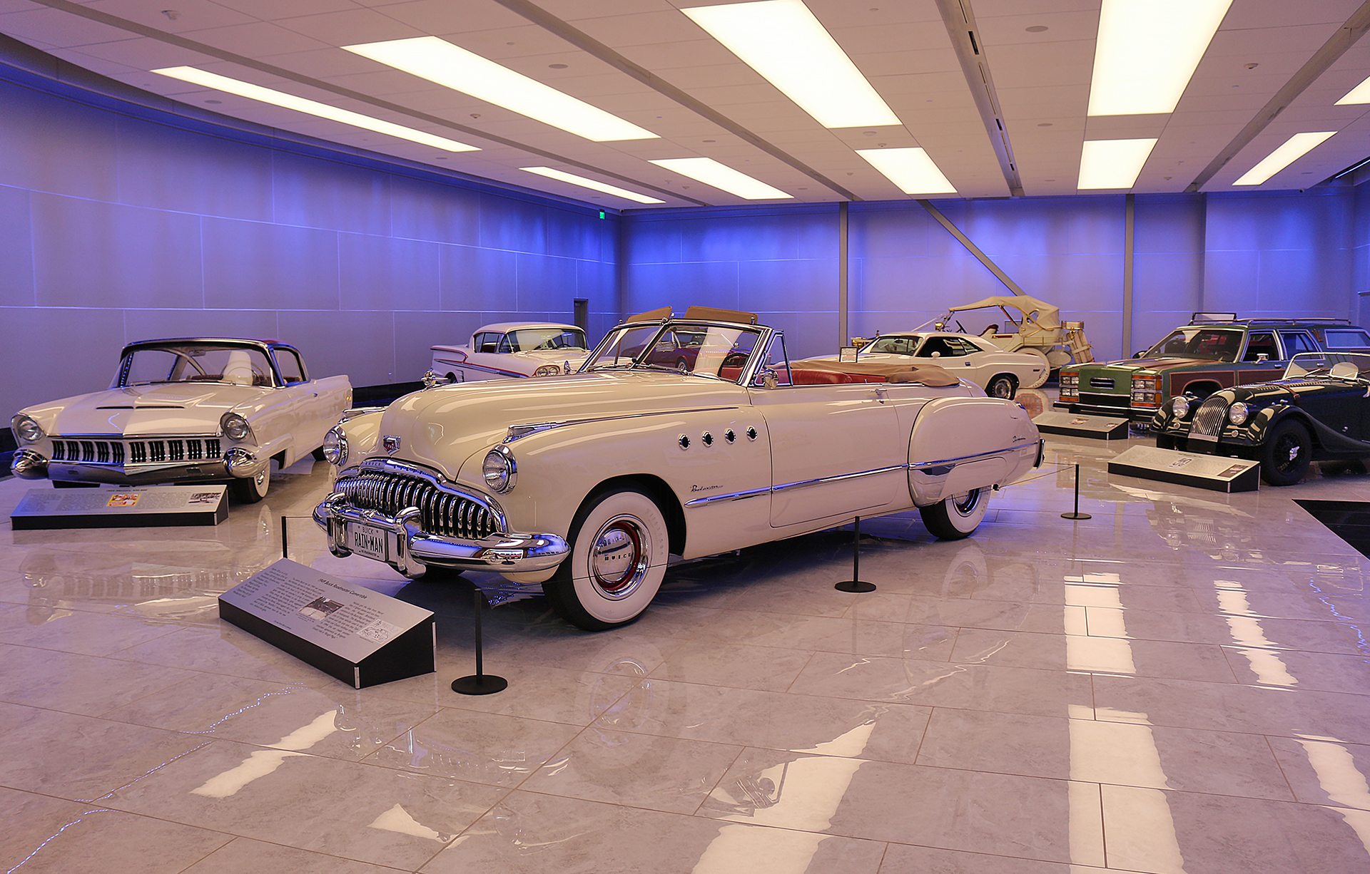 a group of cars in a room