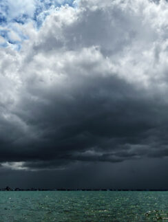 a large dark clouds over water