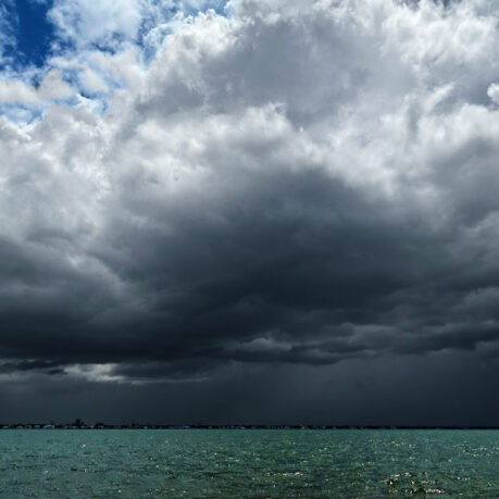 a large dark clouds over water