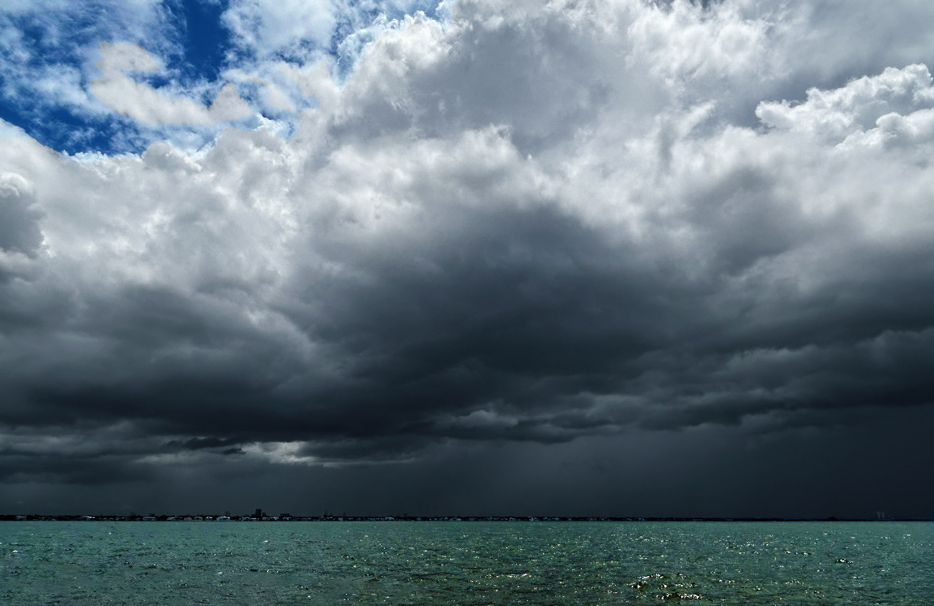 a large dark clouds over water