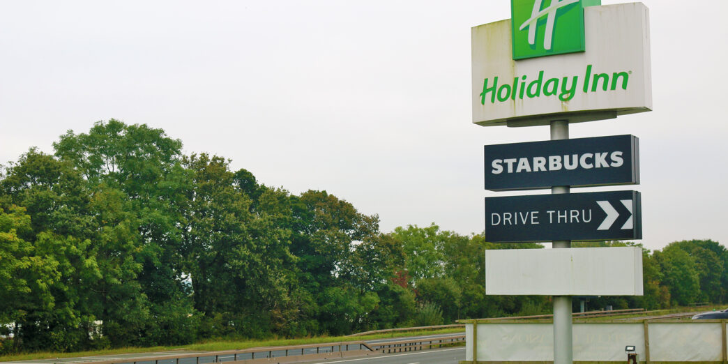 a sign on the side of a road