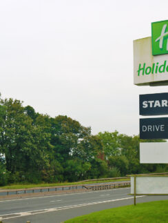 a sign on the side of a road