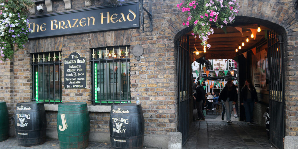 a building with flowers from the front