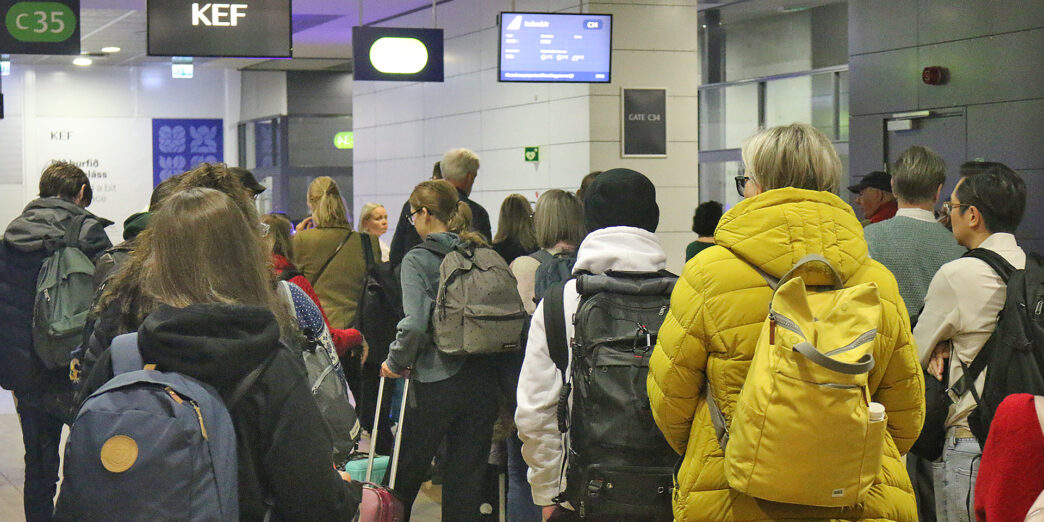 a group of people in a terminal