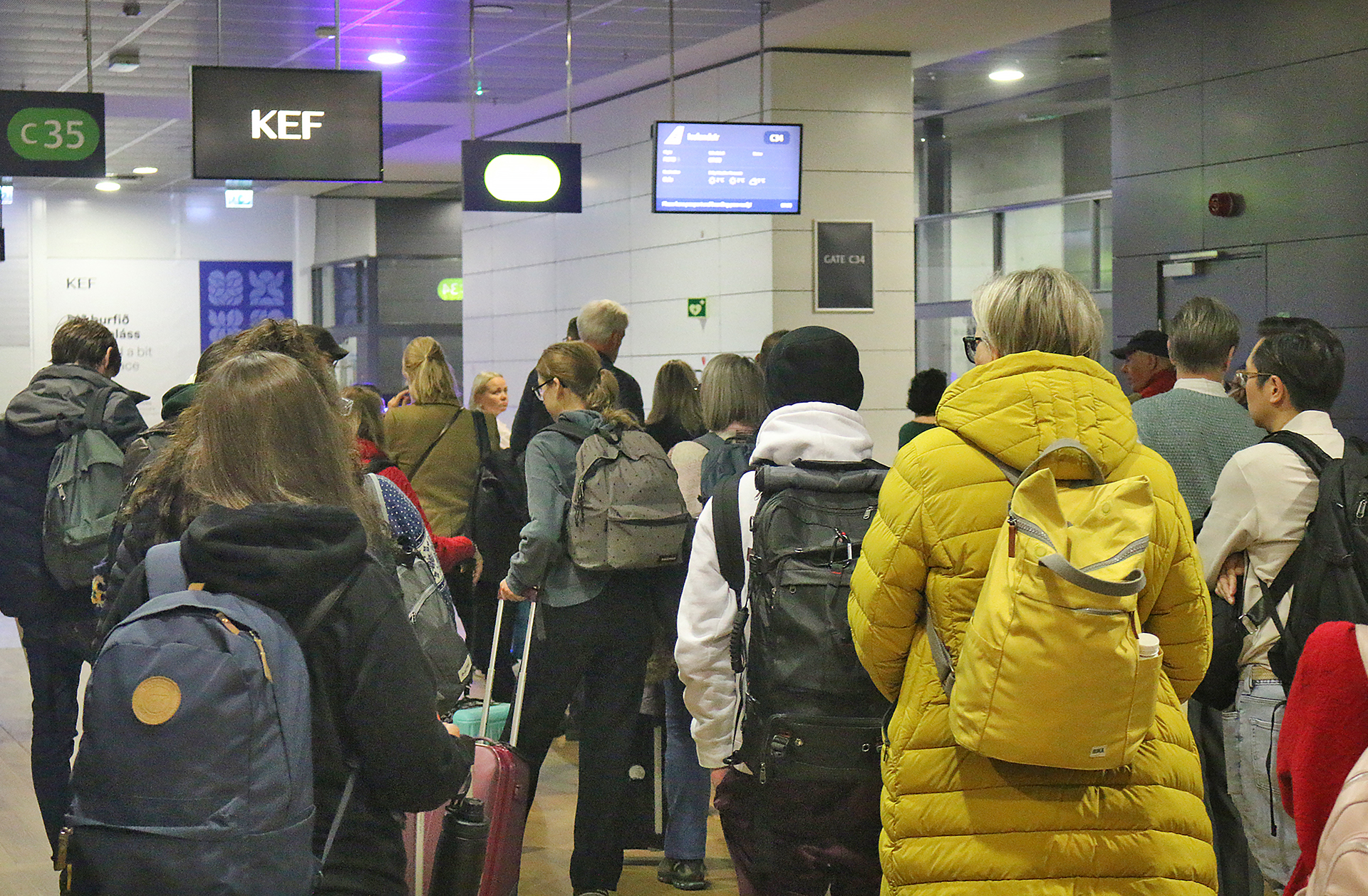 a group of people in a terminal