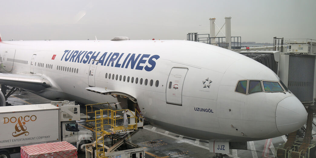 a large airplane being loaded with cargo