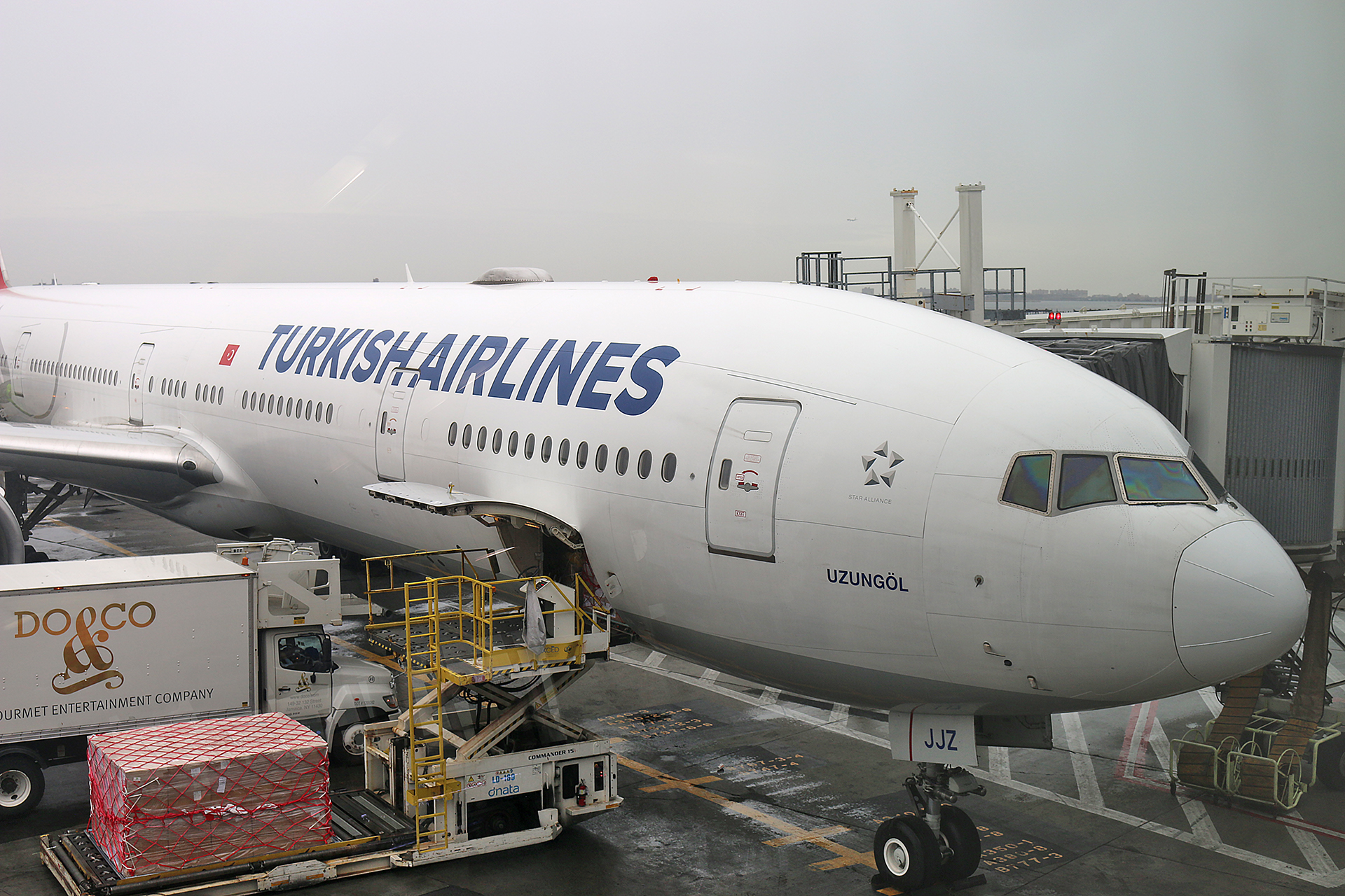 a large airplane being loaded with cargo