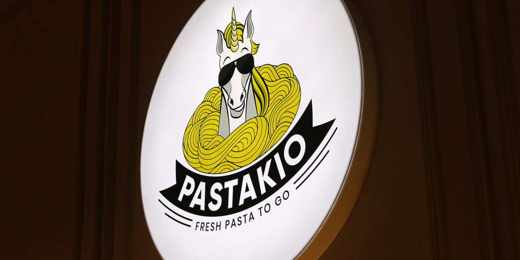 a sign with a horse and sunglasses on it
