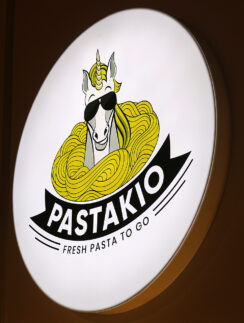 a sign with a horse and sunglasses on it