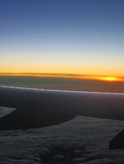 an airplane wing in the sky