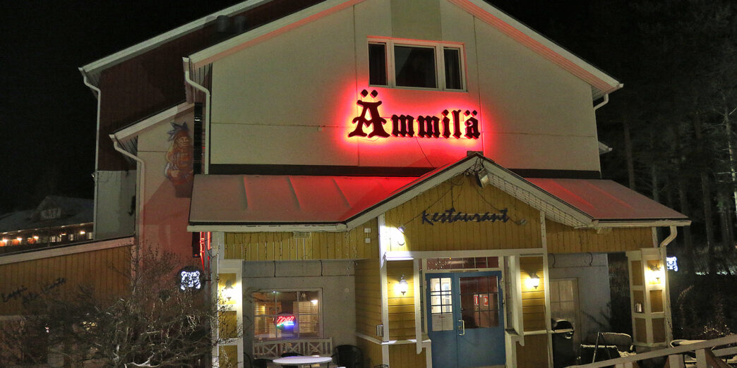 a building with a red sign