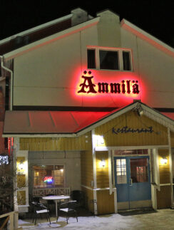 a building with a red sign