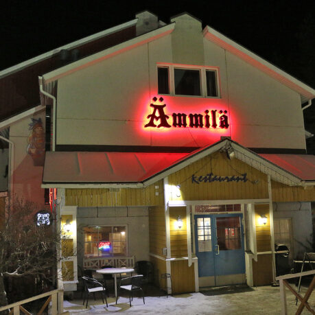 a building with a red sign