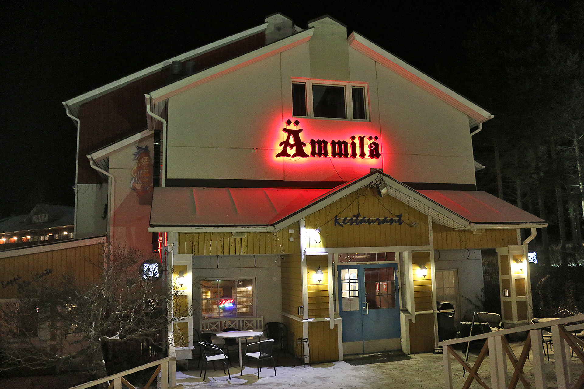 a building with a red sign