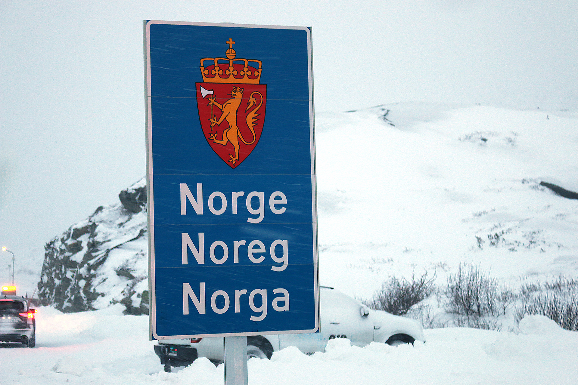 a blue sign with a lion and a lion on it