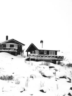 a house on a snowy hill
