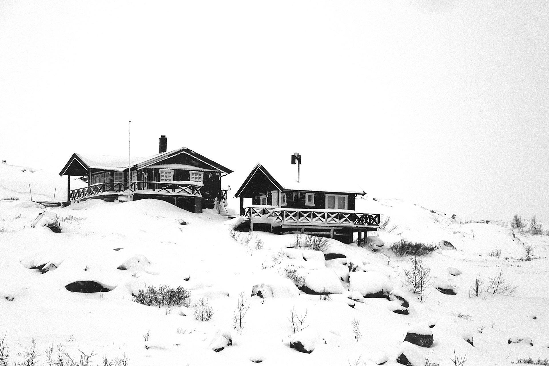 a house on a snowy hill