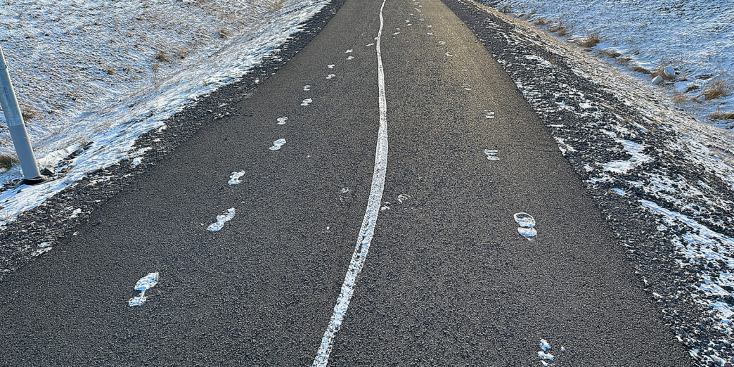 a road with snow on it