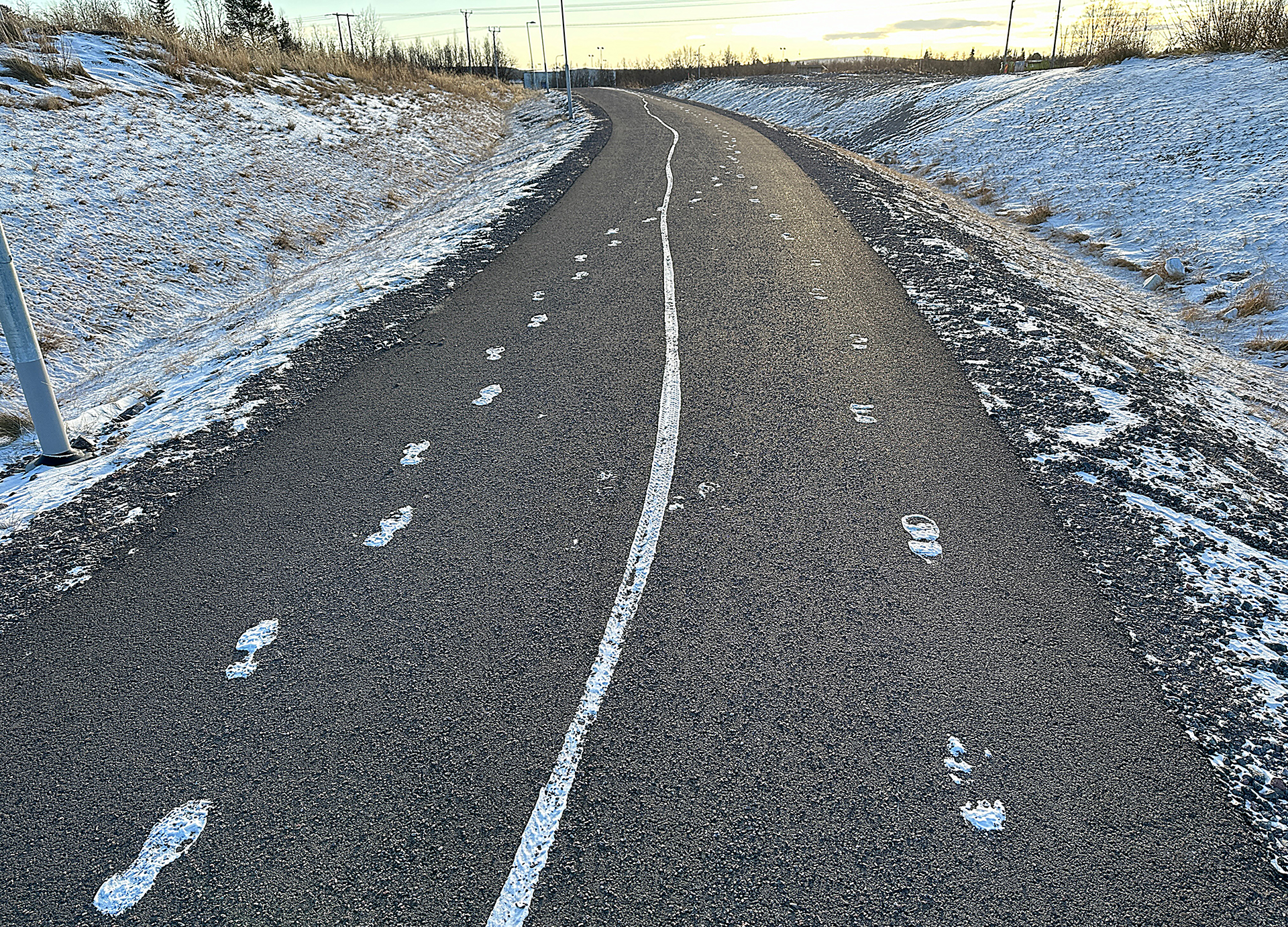 a road with snow on it