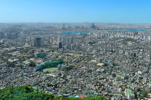 a city with many buildings and trees