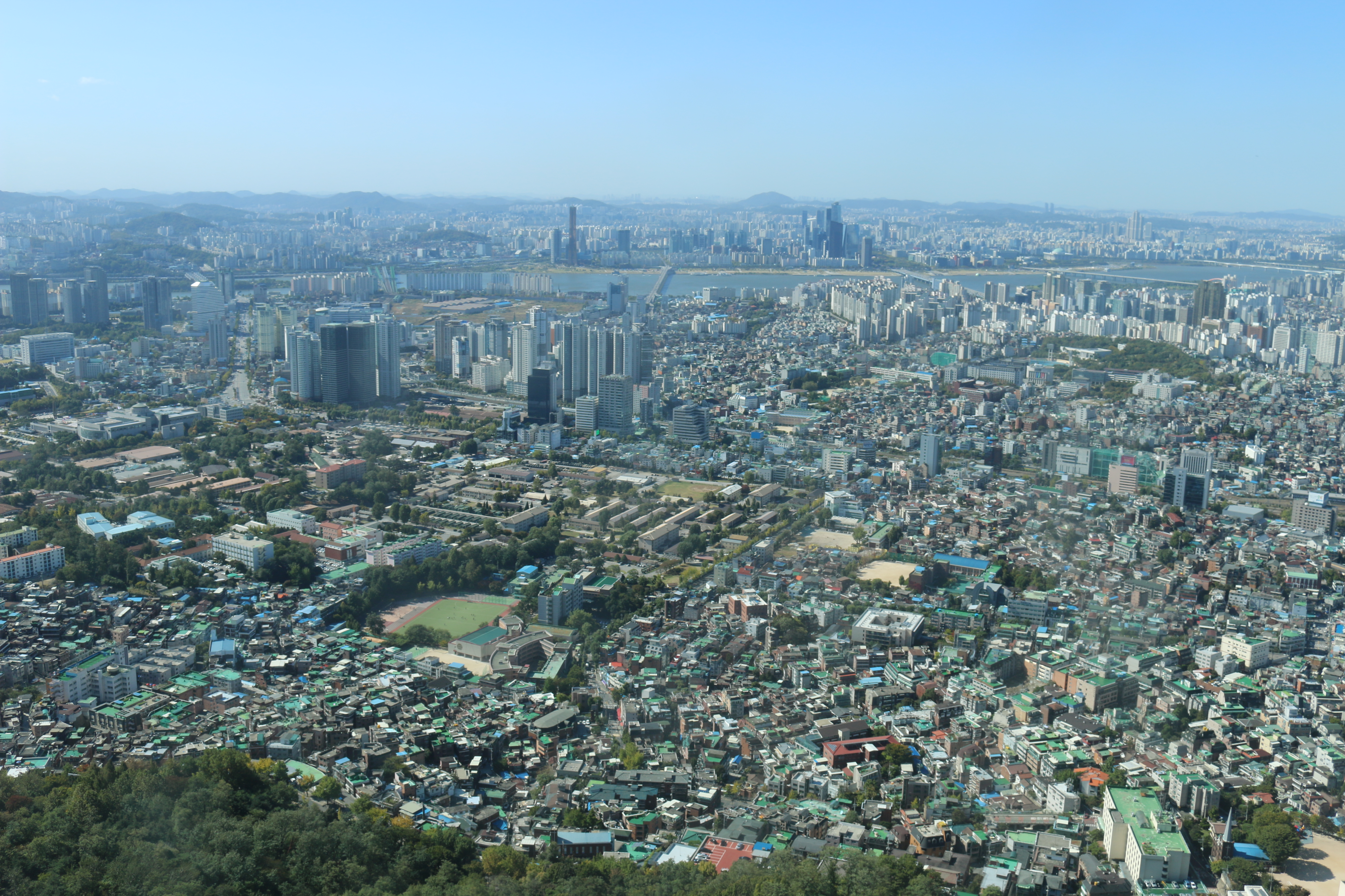 a city with many buildings and trees