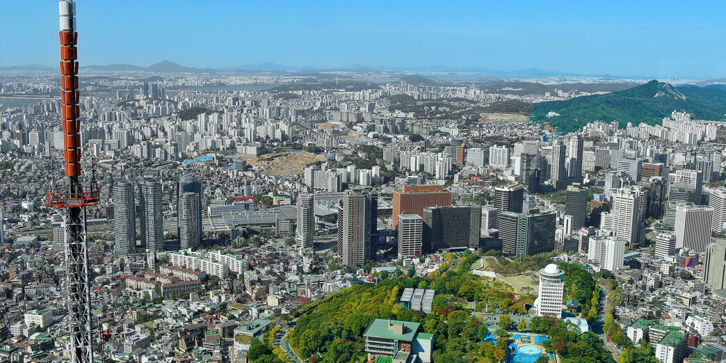 a city with many buildings and trees