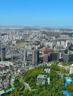 a city with many buildings and trees