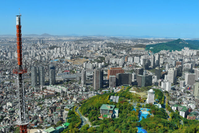 a city with many buildings and trees