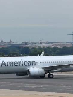 a white airplane on a runway
