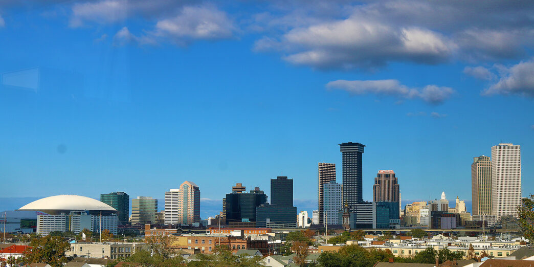 a city skyline with many buildings and trees
