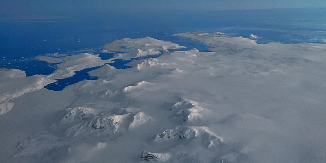 an aerial view of a snowy landscape