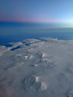 an aerial view of a snowy landscape