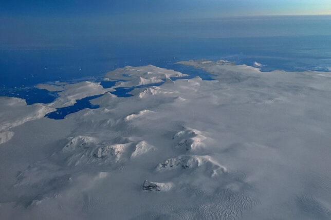 an aerial view of a snowy landscape
