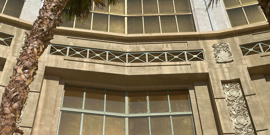 a building with a palm tree