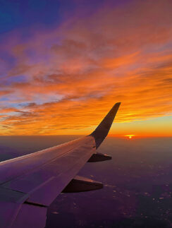 an airplane wing in the sky