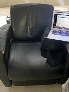 a laptop on a chair