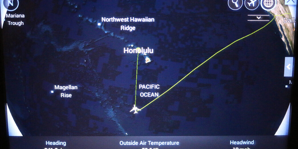 a map of the island with a plane flying