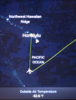 a map of the island with a plane flying