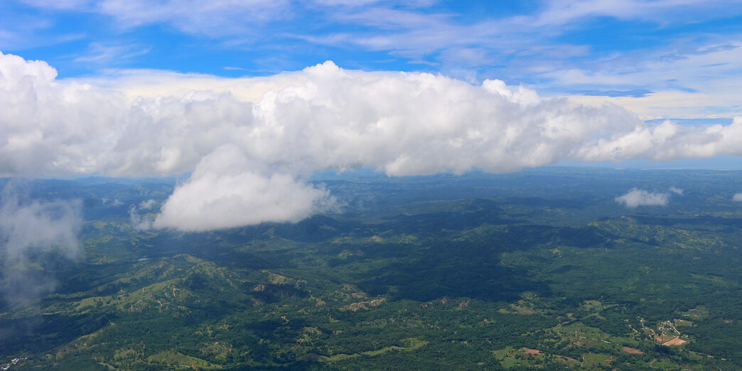 aerial view of a landscape with clouds