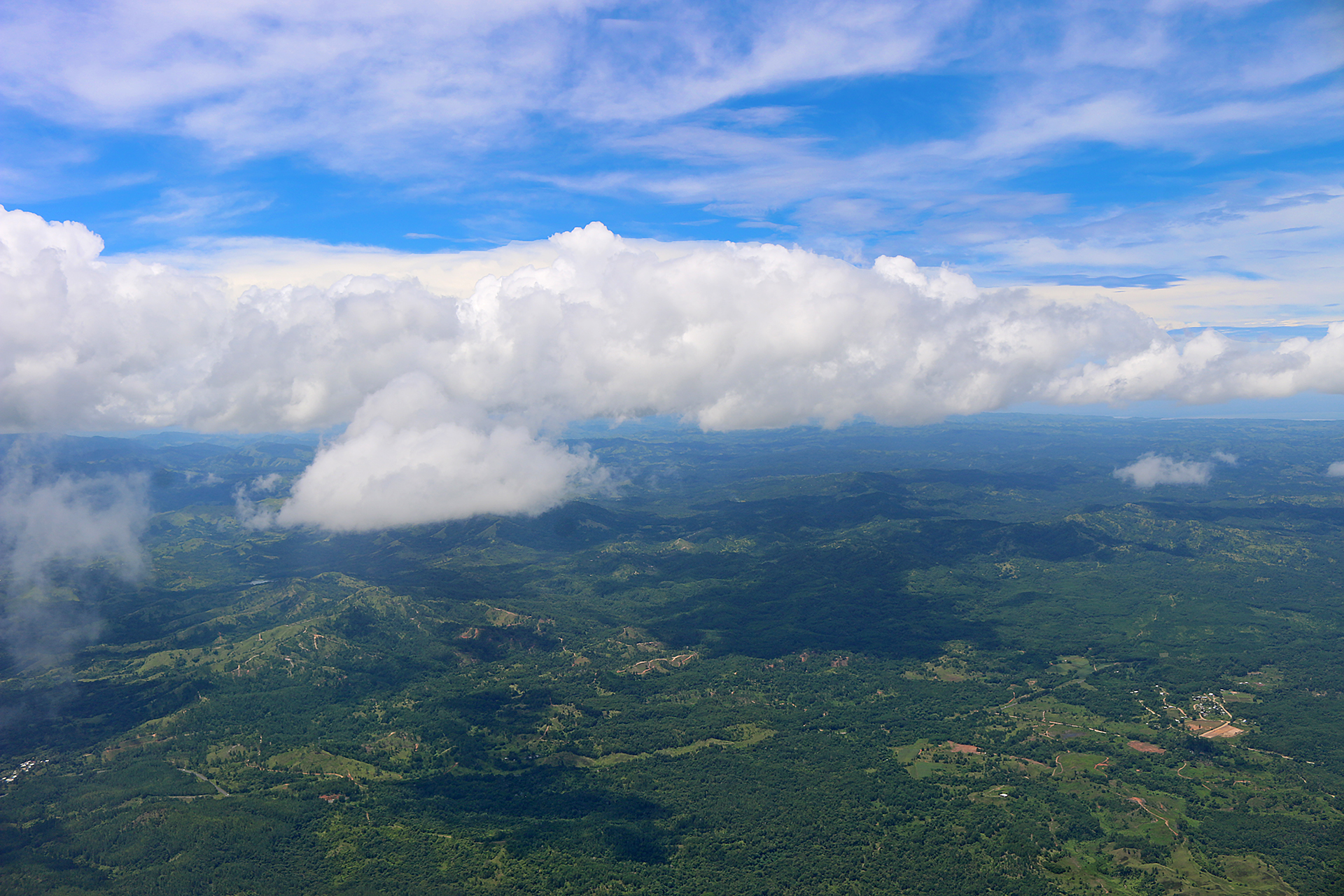 aerial view of a landscape with clouds