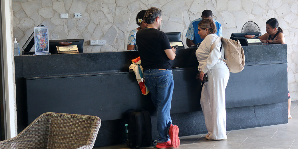 people standing at a counter
