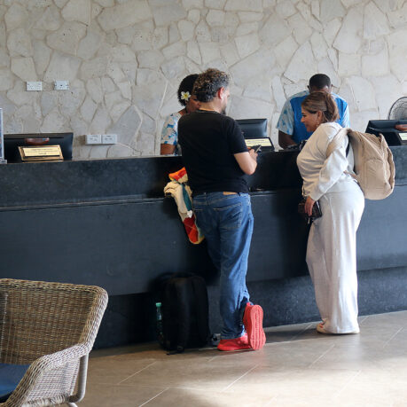 people standing at a counter