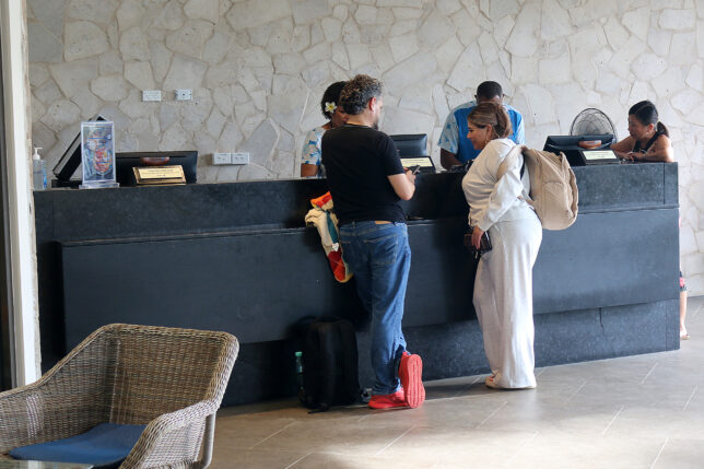 people standing at a counter