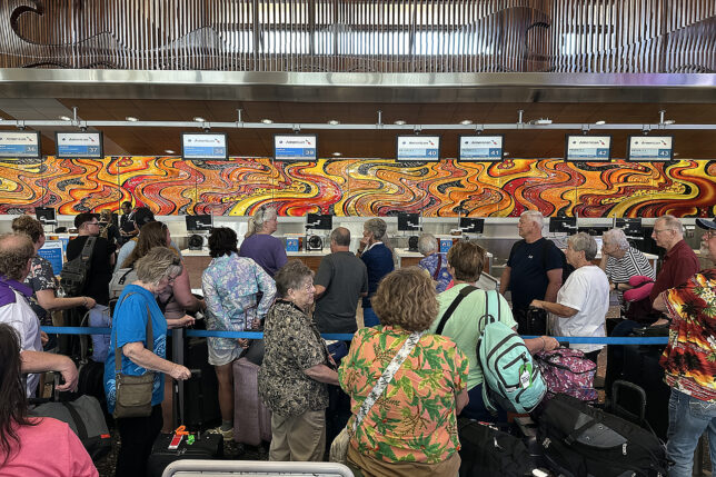 a group of people standing in a line