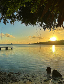 a sunset over a body of water