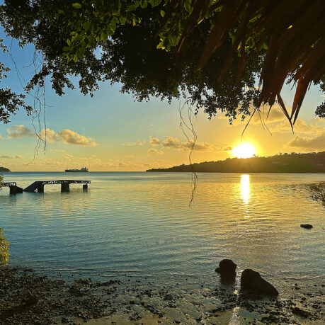 a sunset over a body of water