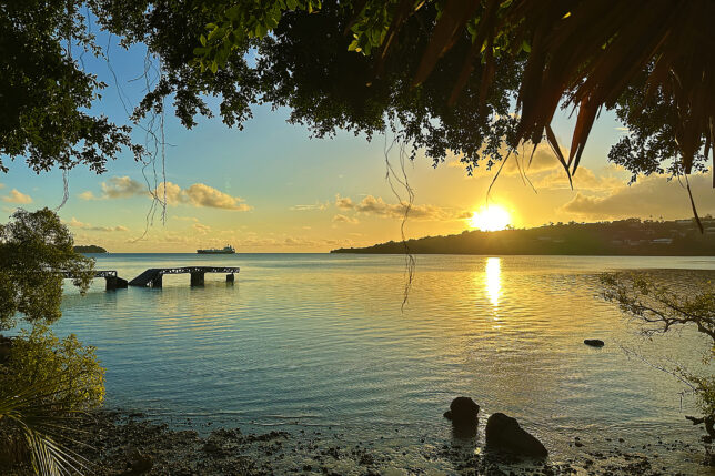 a sunset over a body of water