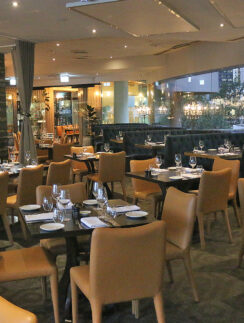 a restaurant with tables and chairs