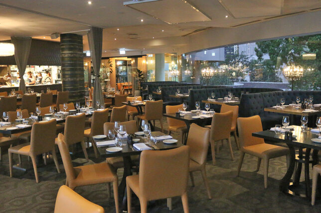 a restaurant with tables and chairs