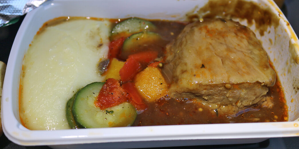 a white container with food in it